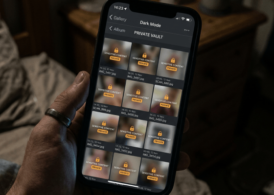 Phone screen showing private vault with multiple locked sensitive content files in dark mode