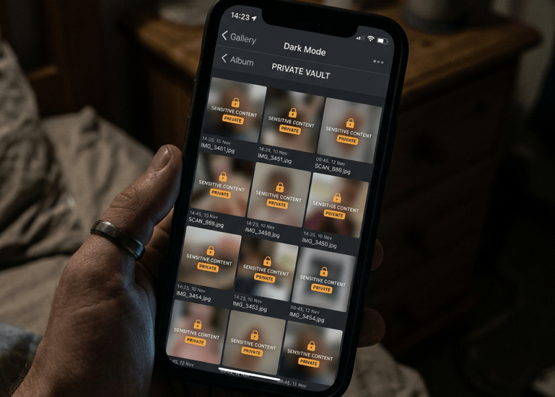 Phone screen showing private vault with multiple locked sensitive content files in dark mode